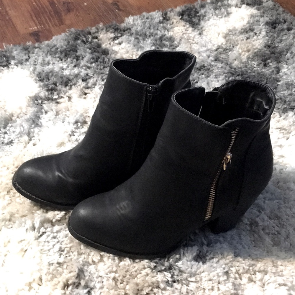 Woman’s black boots